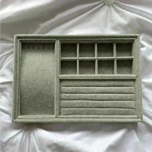 Jewelry - Woman’s grey jewlery holder with sections for rings, necklaces,  bracelets